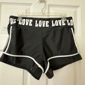 Love athletic shorts / Black with white trim. size L